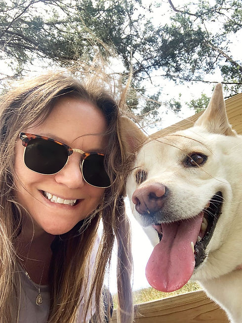 Dog walker and Shiba Inu smiling after a walk at Stono River County Park in Charleston, SC, enjoying the outdoors and fresh air