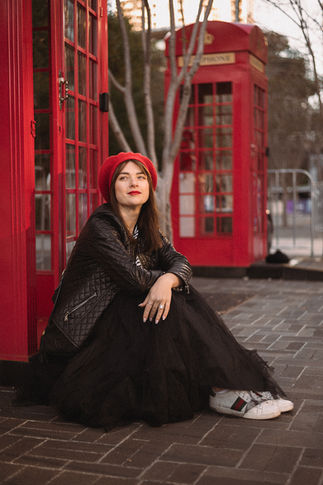 French Inspired Female Portrait in red beret in Sydney with red phone booth