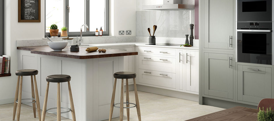 white kitchen with breakfast bar and seating