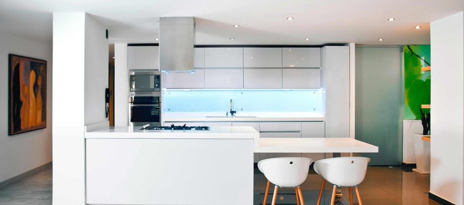 white kitchen space with seating