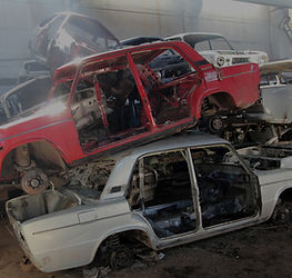 Scarp cars piled on top of each other