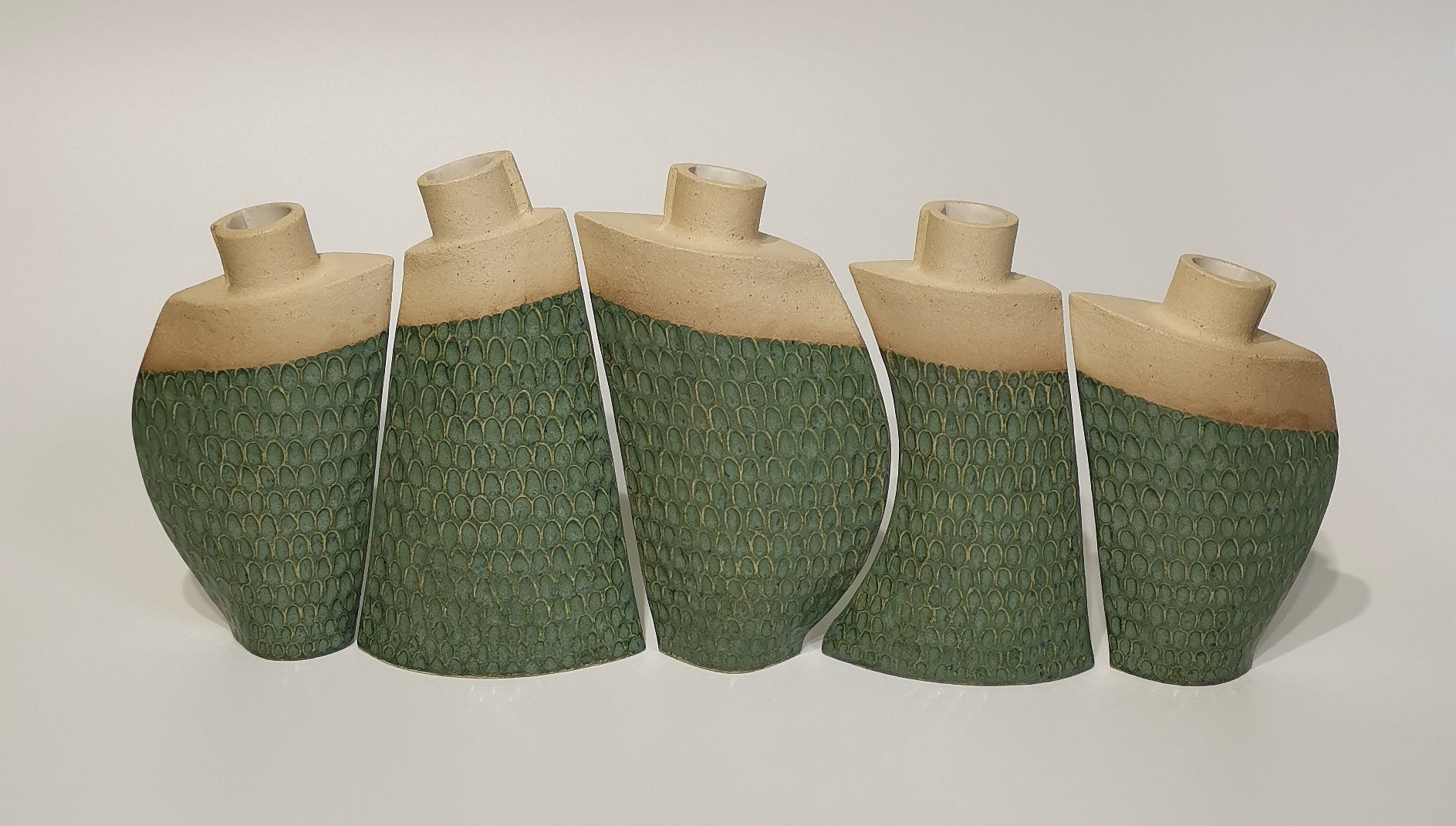 Set of 5 'fish scale' design vases