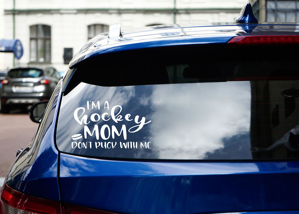 A picture of a car decal saying "I'm a hockey mom. Don't puck with me."