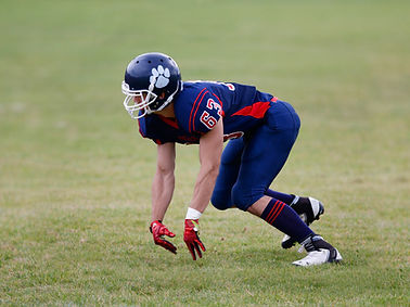 Football Player Preparing