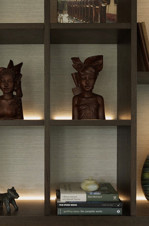 Oak shelving with lighting design and textured finishes
