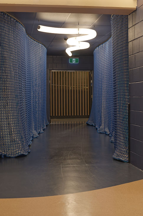 Curtain storage partitions in office interior 
