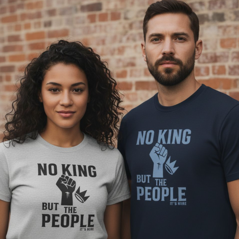 Eye-level view of a protester wearing a t-shirt with a clear activist message