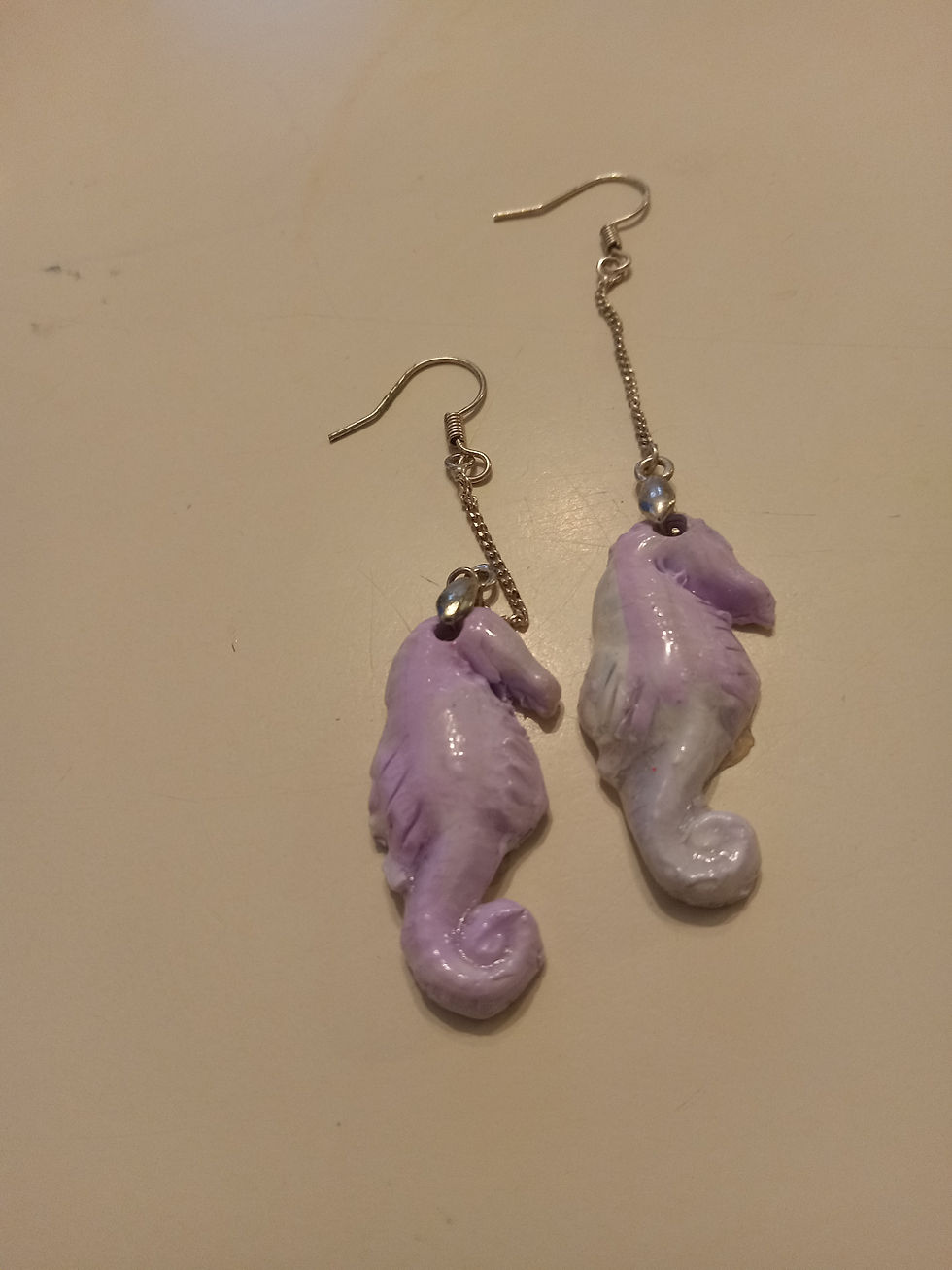 purple sea horse earring