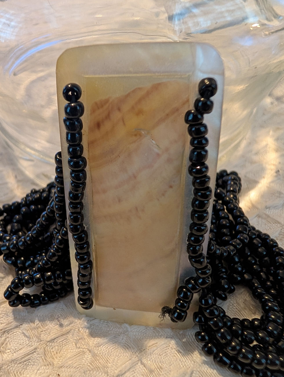 Thumbnail: Black small sea beads with the polymer clay piece