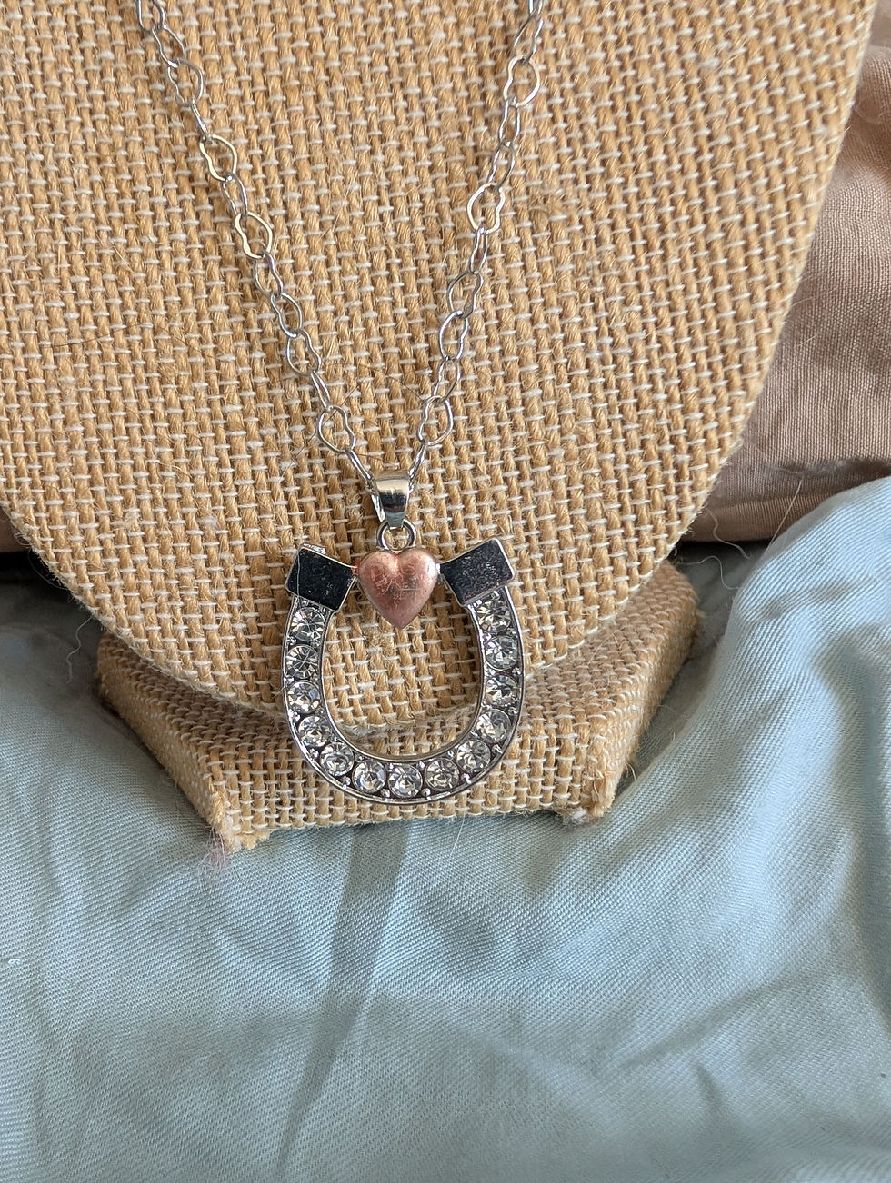 Thumbnail: horseshoe pendent