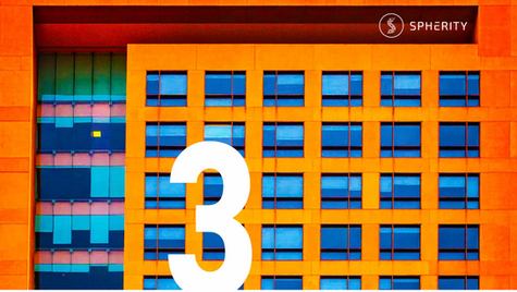 Orange building facade with blue windows, large white number 3 overlay, colorful reflections on the left. Text: SPHERITY logo above.