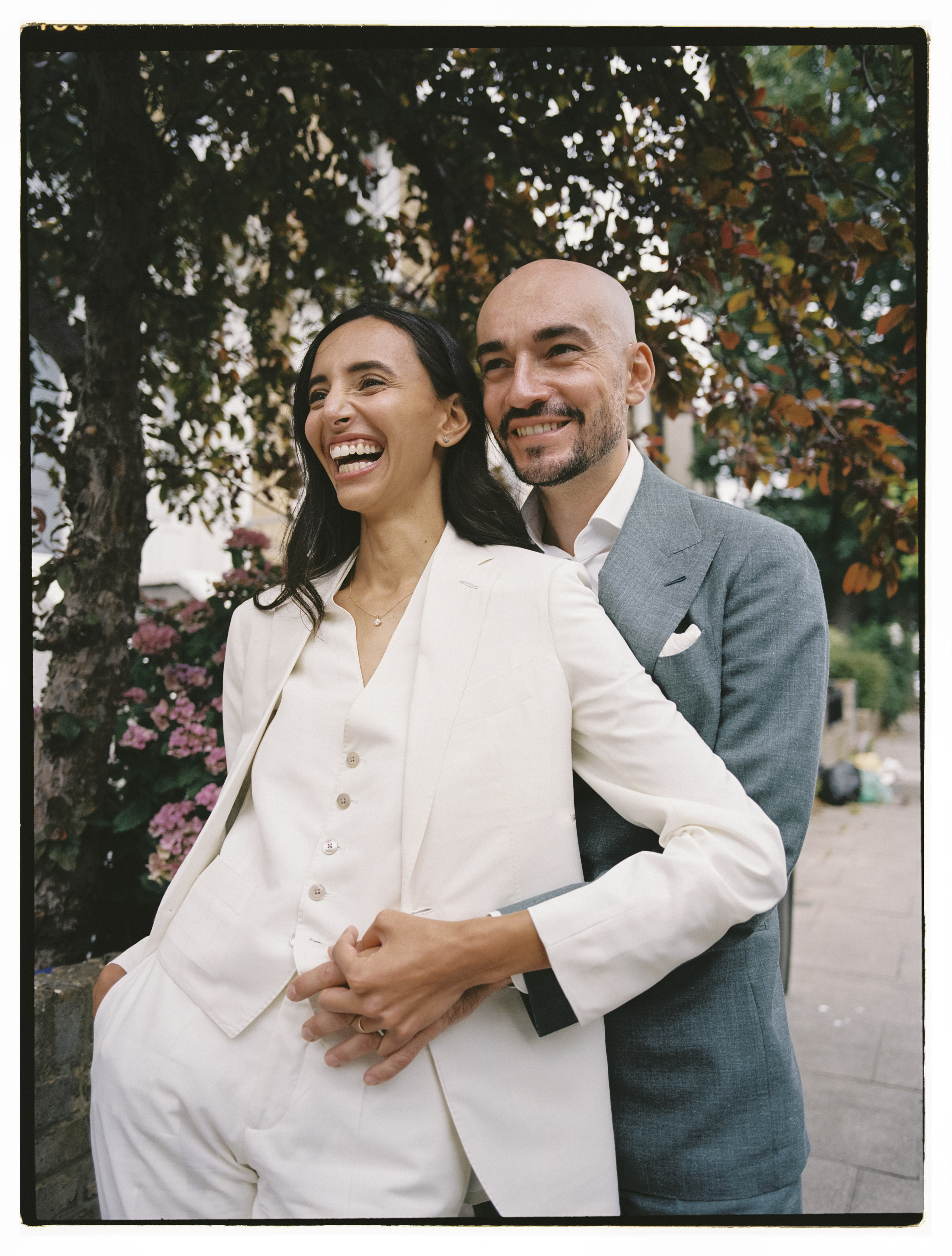 Iman in sage green pantsuit at Hackney Town Hall — London editorial wedding photography