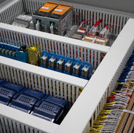 Nearly completed electrical control panel with organized wiring and components.