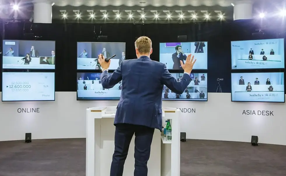 Sotheby's auctioneer conducting remote sales internationally, including from online bidders. Courtesy of Sotheby's.