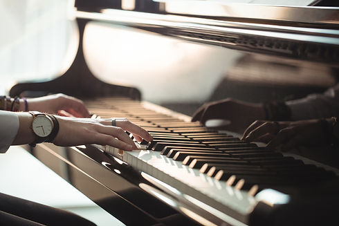 woman-playing-piano.jpeg