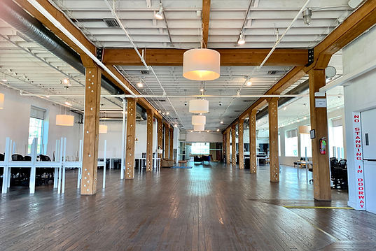 Open space with wooden beams and lighting