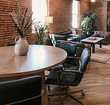 August Real Estate Co. office interior with seating area