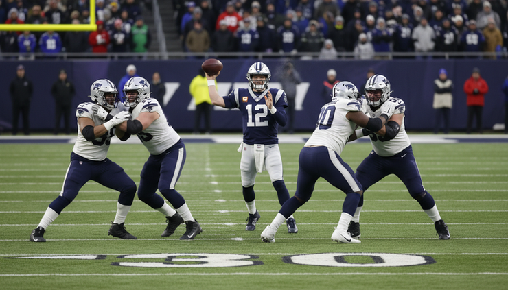 Høyt vinkelbilde av en quarterback som kaster pasning mens linjen holder presset unna