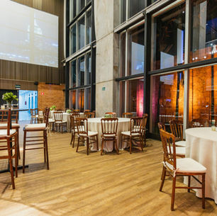 Empty racquet sports club event space set up for a social night with no members present