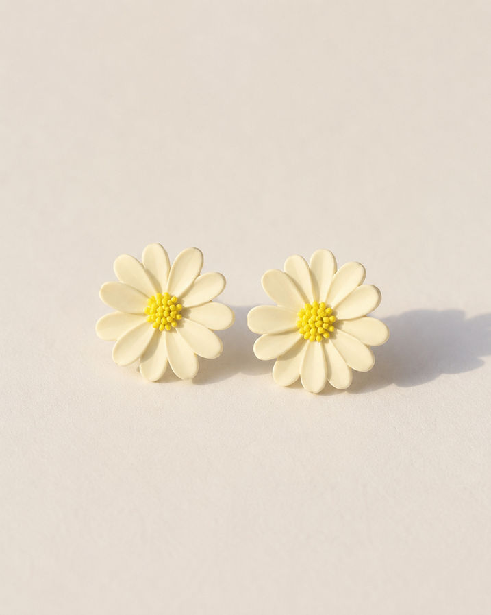 Close-up of Korean daisy stud earring in with 925 silver post