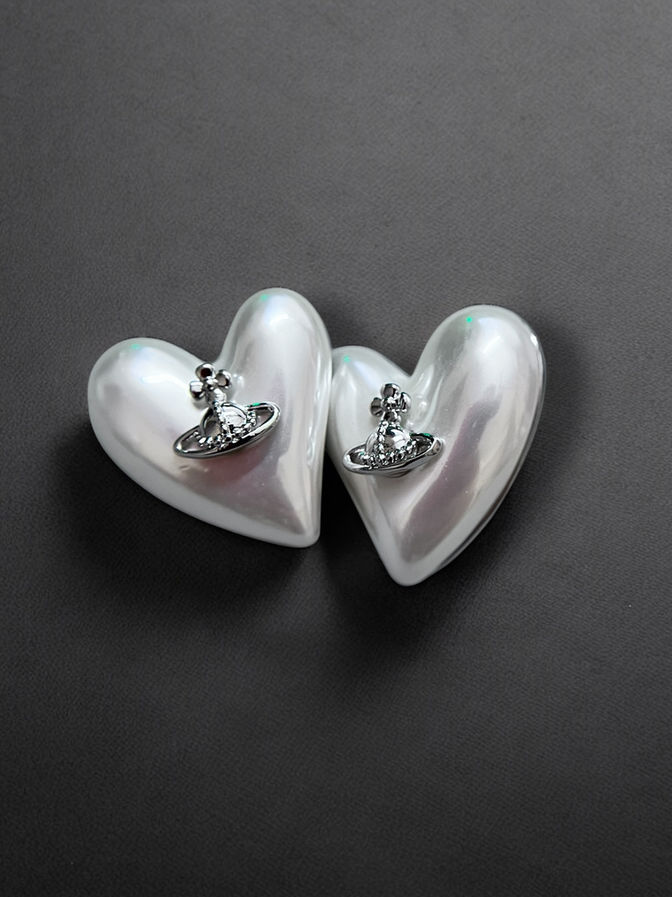 White heart stud earrings with silver crown embellishment