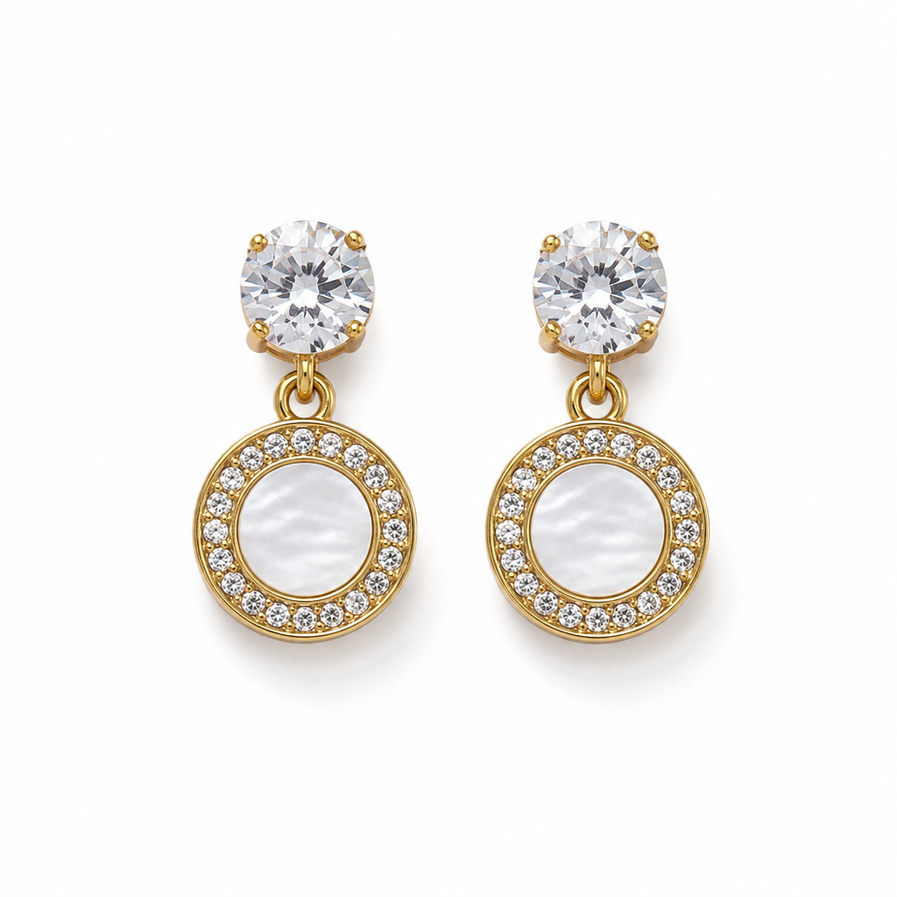 Gold-tone round stud-drop earrings with crystal-style top and pearl-look centre worn by a model.