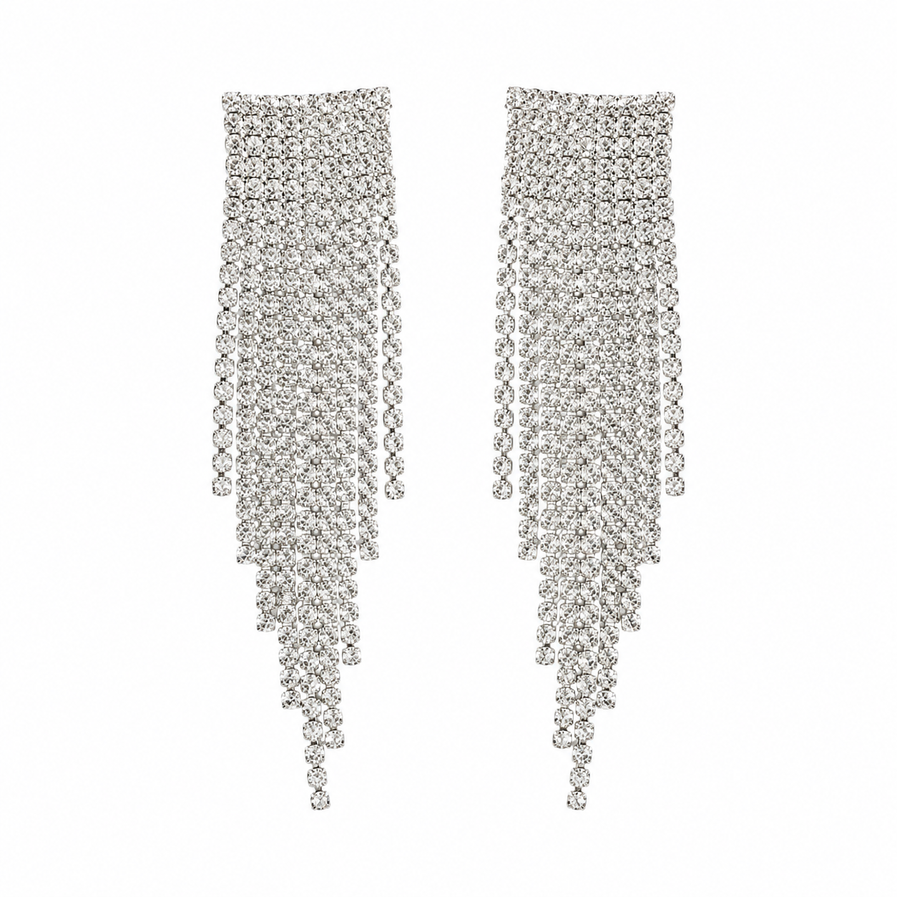 Pair of silver crystal rhinestone waterfall dangler earrings on white background