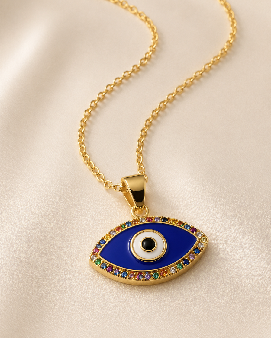Close-up of blue nazar pendant necklace styled on an Indian model with a gold-tone chain