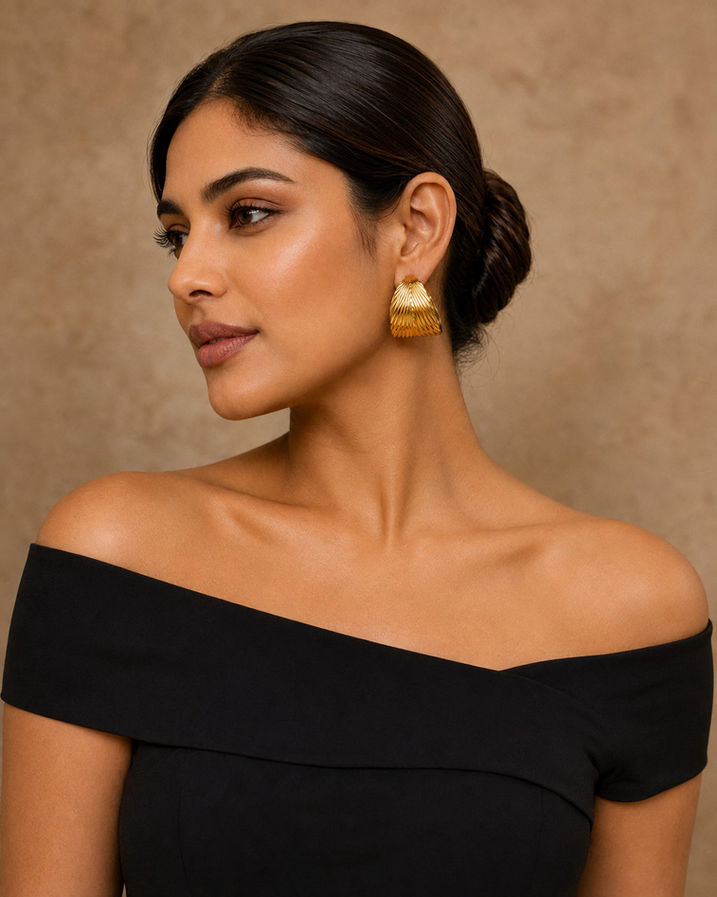 Bold gold half hoop earrings for party and evening wear