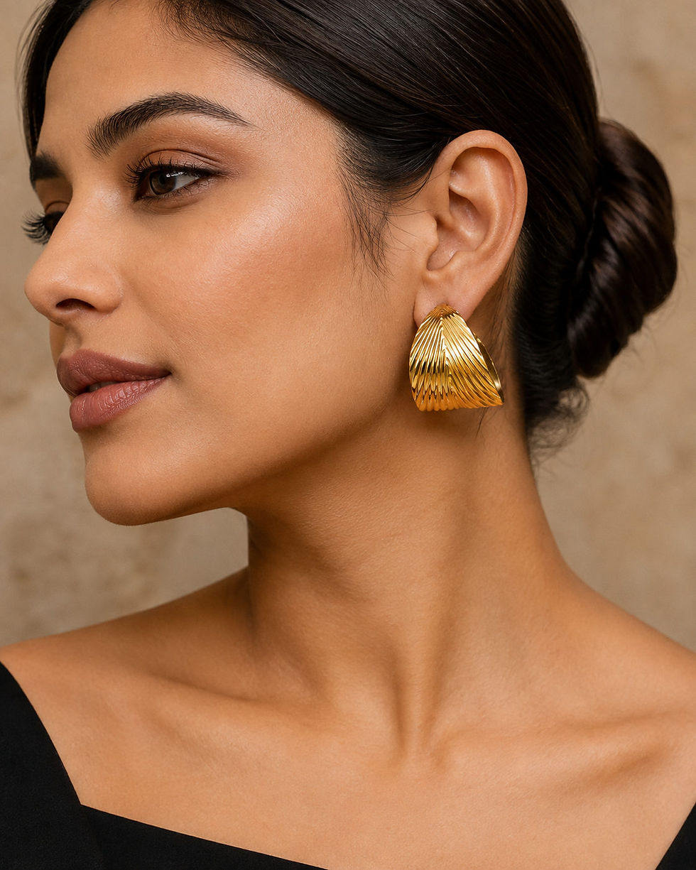 Bold gold half hoop earrings for party and evening wear