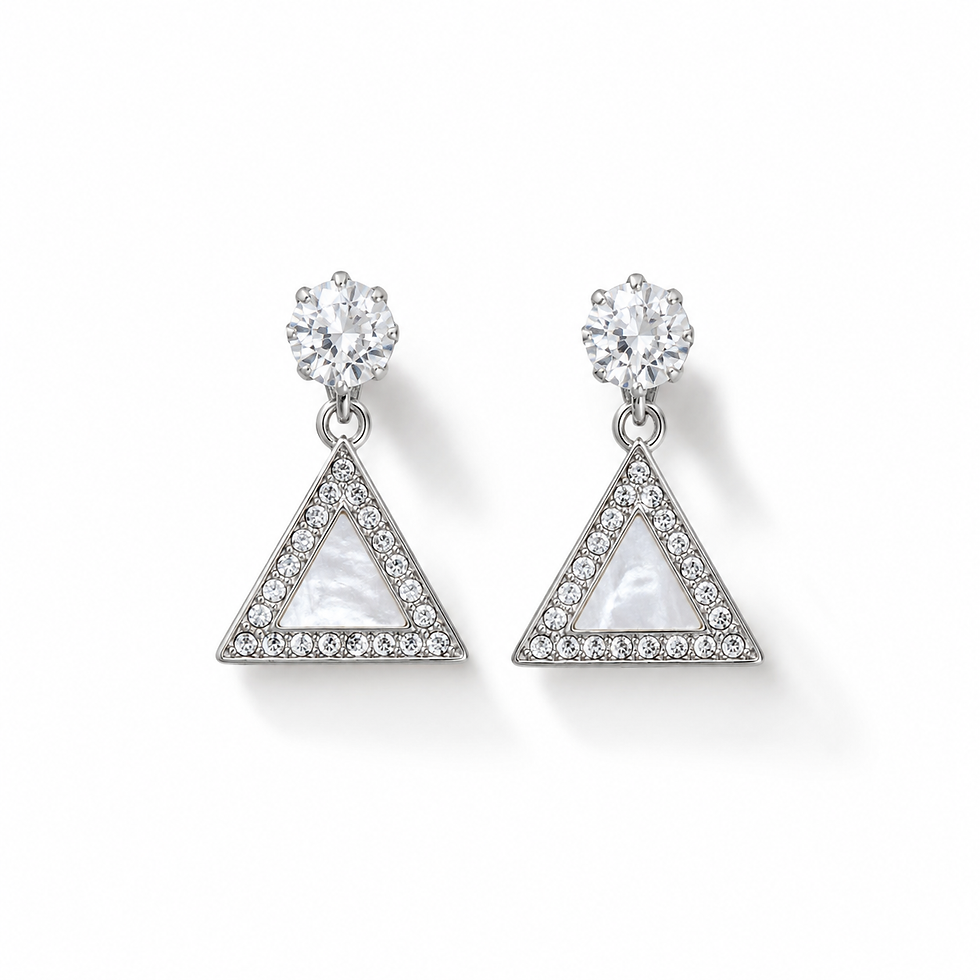 Model wearing silver pyramid stud-drop earrings with crystal-style top and white pearl-look centre.