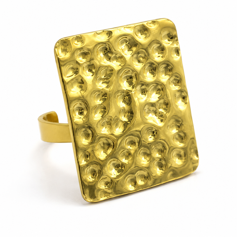 Square hammered gold brass ring on white background