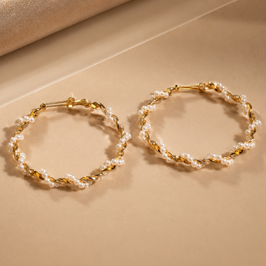 Large statement hoop earrings with clustered white pearls