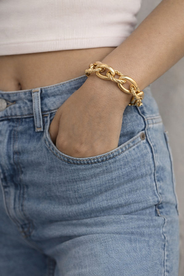 Chunky stretch gold plated bracelet with oval and twisted links