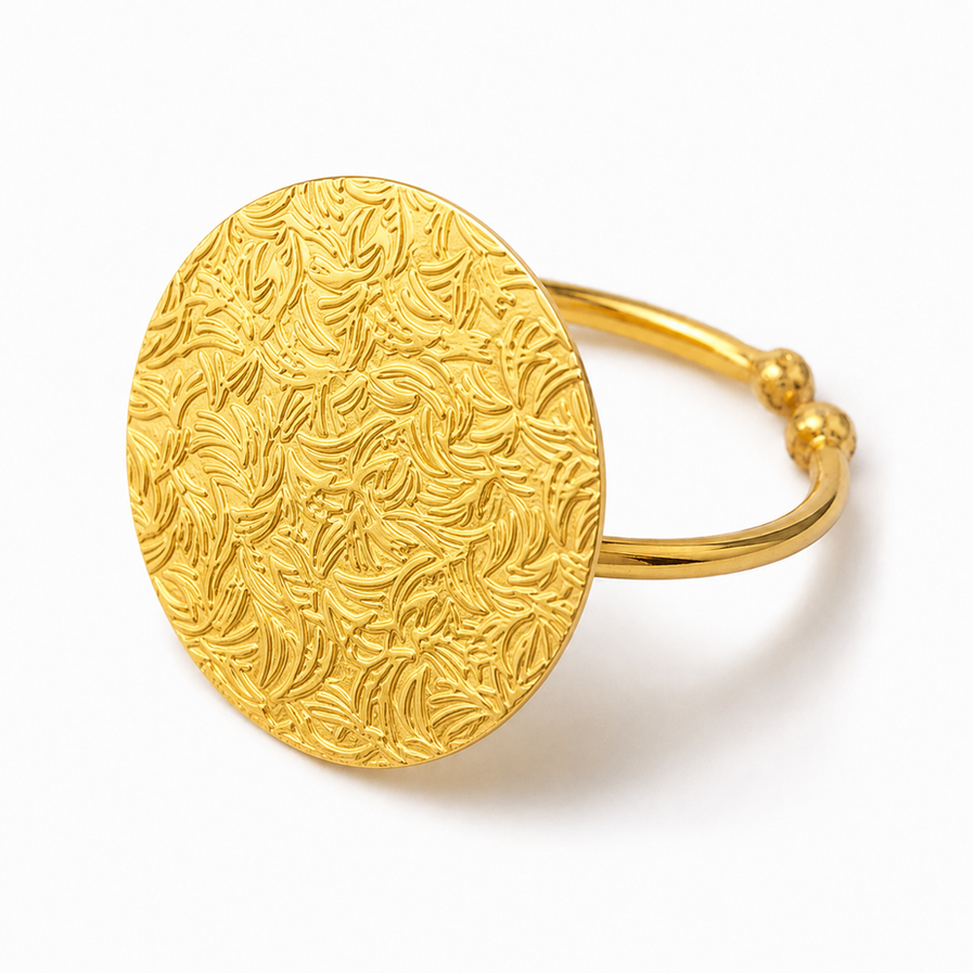 Silver disc gold brass ring on white background