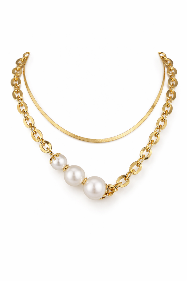 Elegant gold link necklace with layered chain and pearls