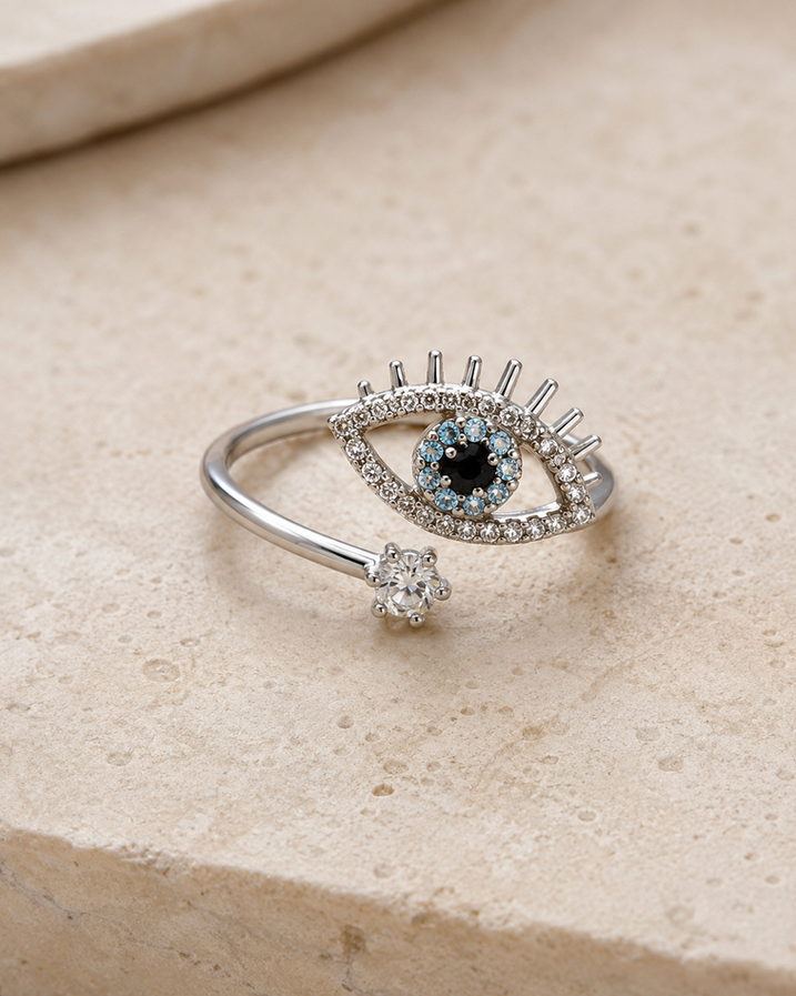 Close-up of an Indian model wearing a silver-tone crystal evil eye adjustable ring