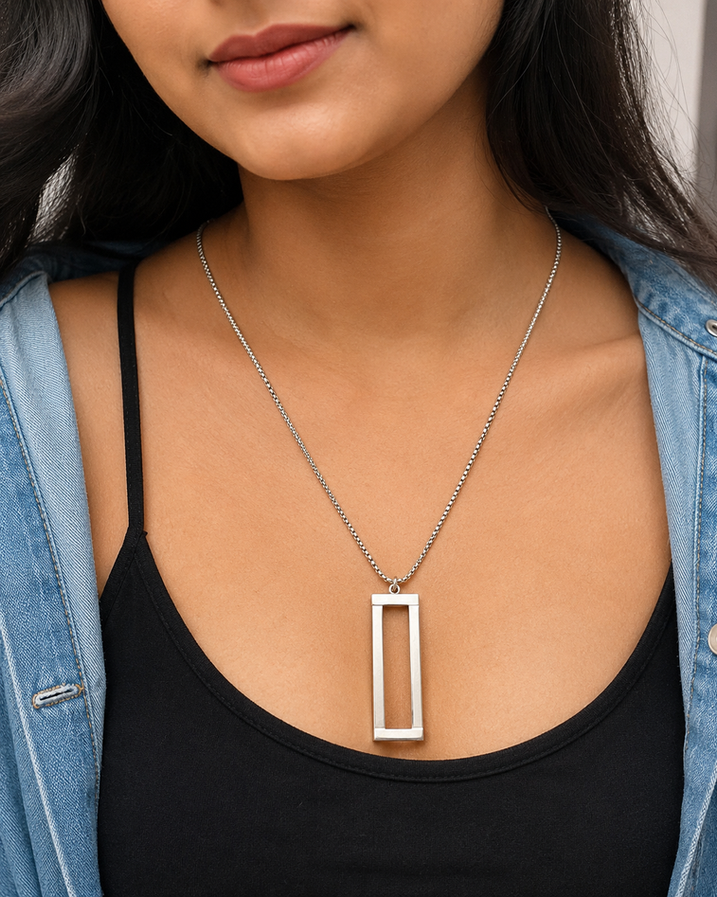 Indian model wearing 2.5-inch open rectangle stainless steel pendant
