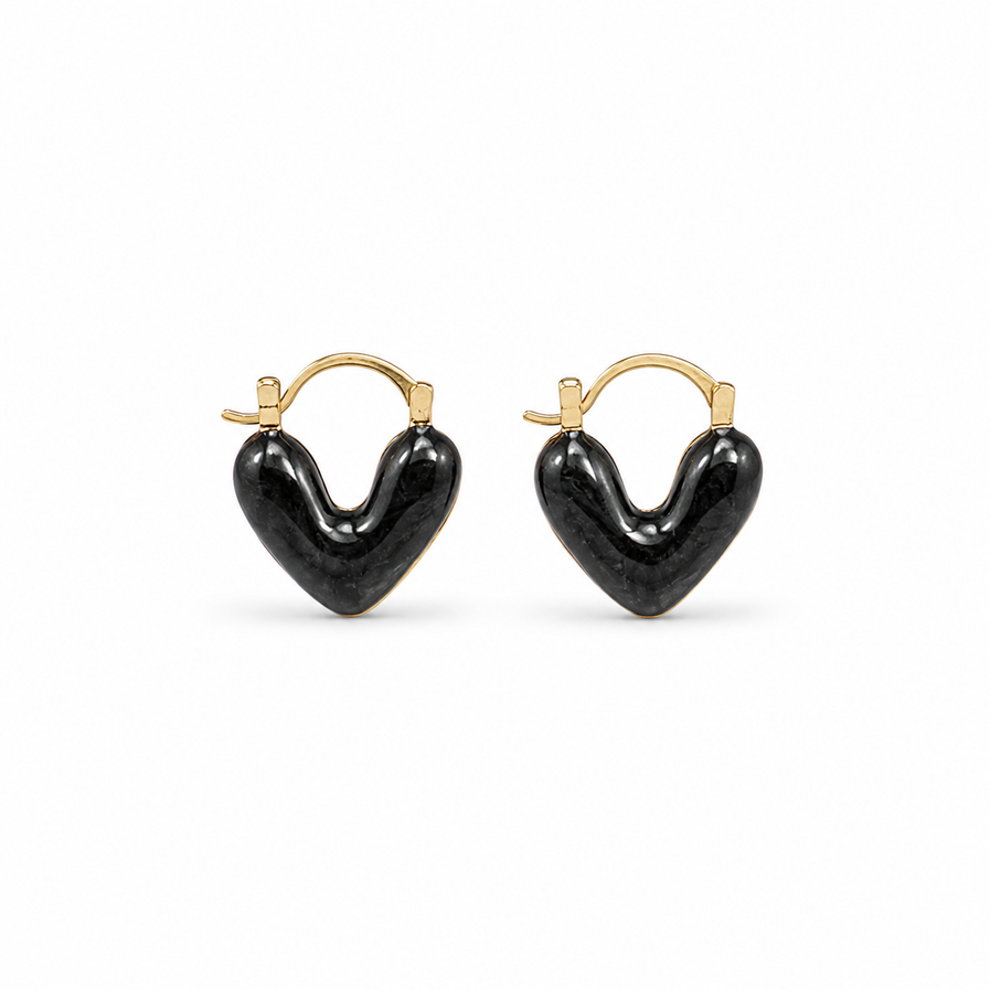 Glossy black heart hoop earrings with gold-tone fastening on white background