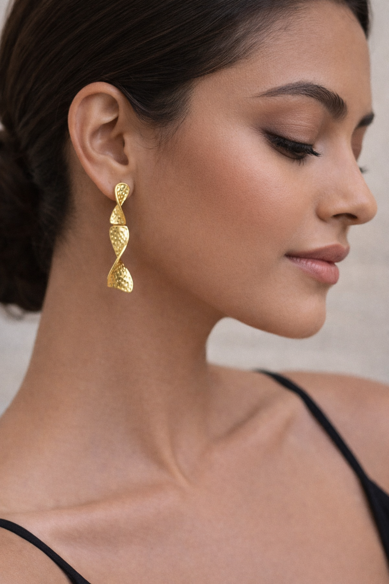 Twisted drop statement earrings in high-quality gold plated finish