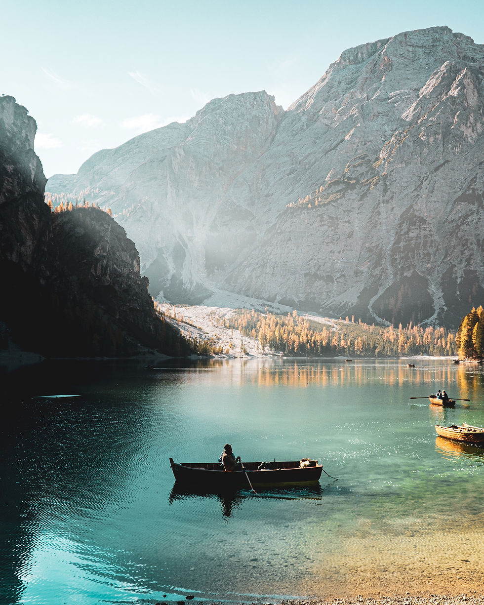 vertical-shot-person-sailing-parco-naturale-di-fanes-sennes-braies-prags-italy.jpg
