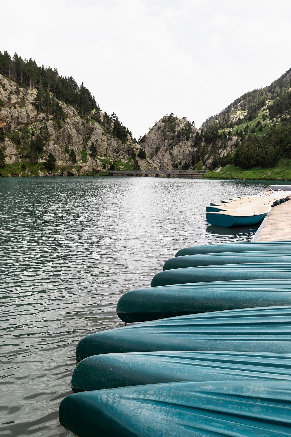 canoe-boats-align-water.jpg
