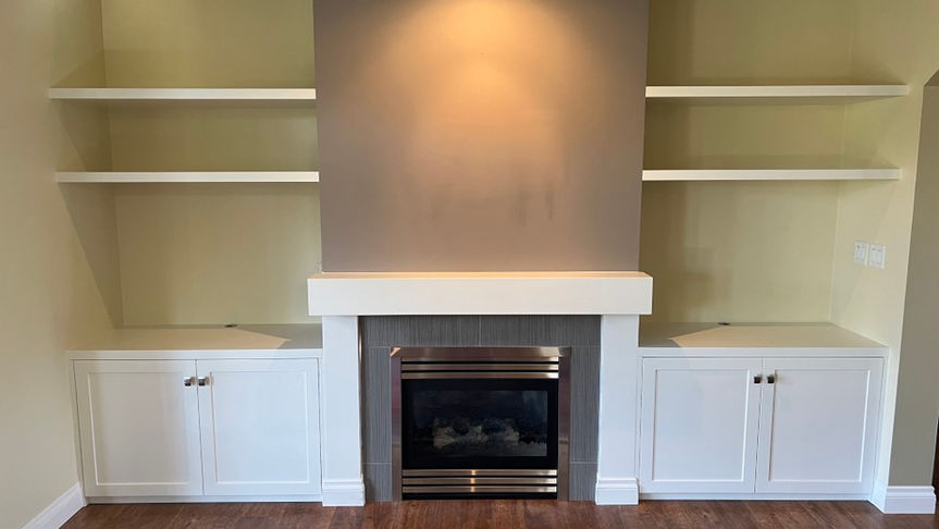 Mantle, cabinets and shelves in satin white