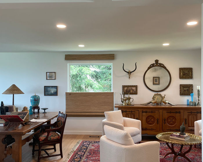 Woven wood shade with valance in a living room