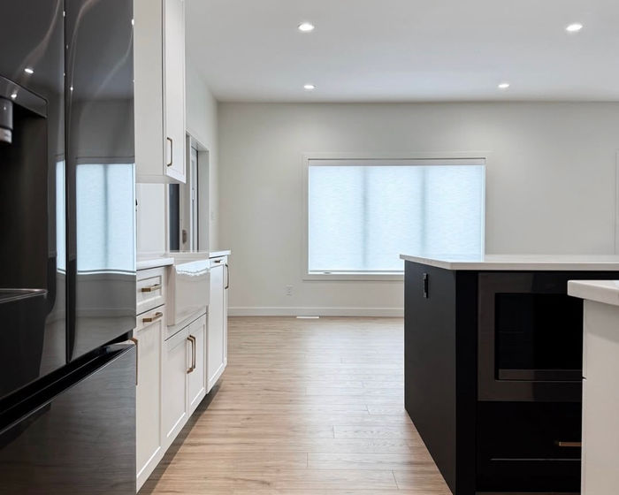 Light-filtering roller shade in a new-build kitchen