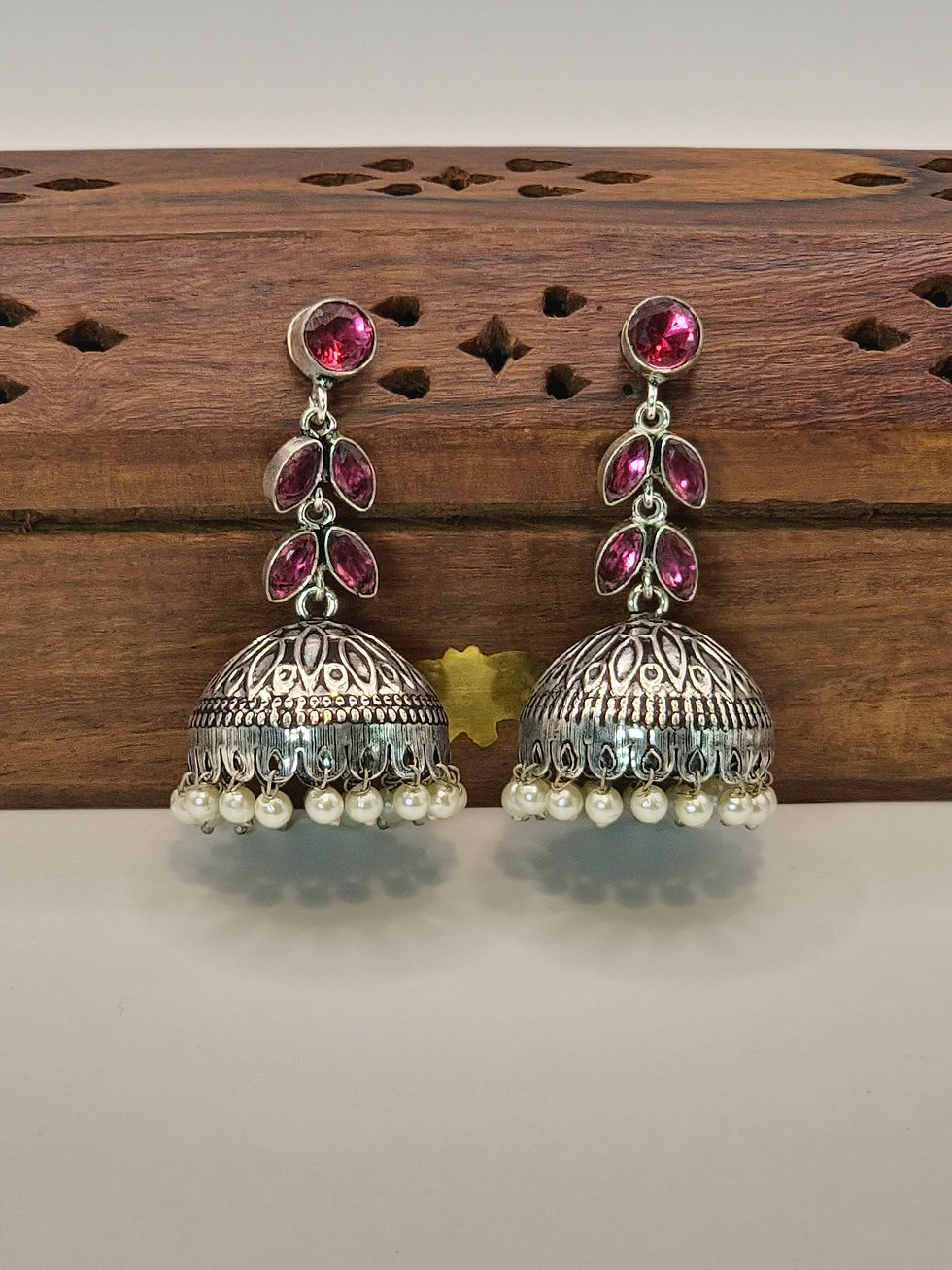 Thumbnail: Oxidised Silver Jhumka Earrings with Gemstone & Pearl Detailing