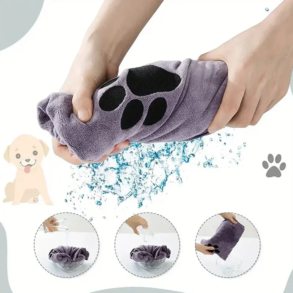 Hands wringing water from a thickened grey pet towel.