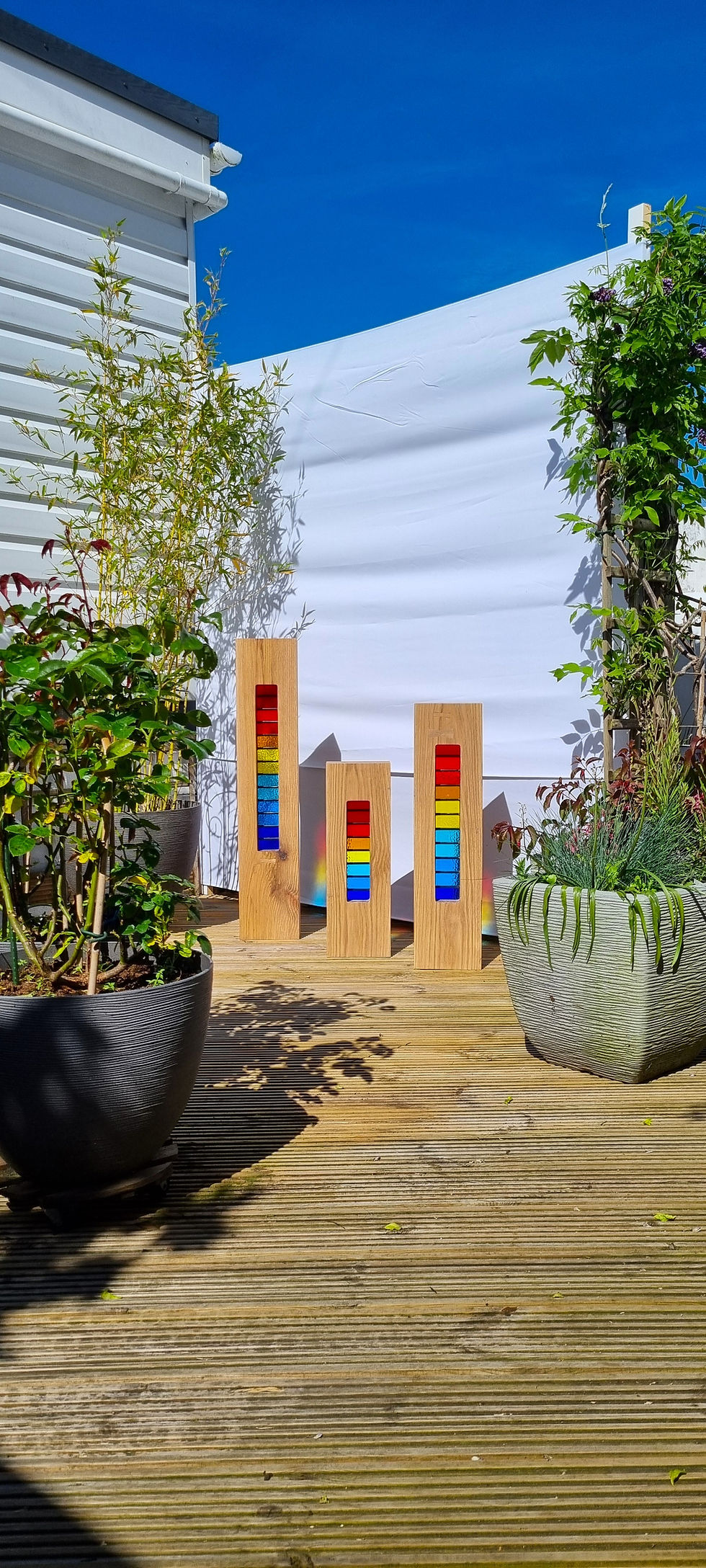 Thumbnail: Set of three Solid Oak Rainbow sculptures