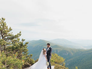 a couple getting married on a mountain