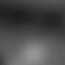 couple slow dancing in a spotlight